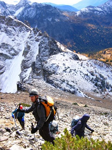 The snowy back side of the ridge below us should have been a warning about conditions on the final summit ridge.